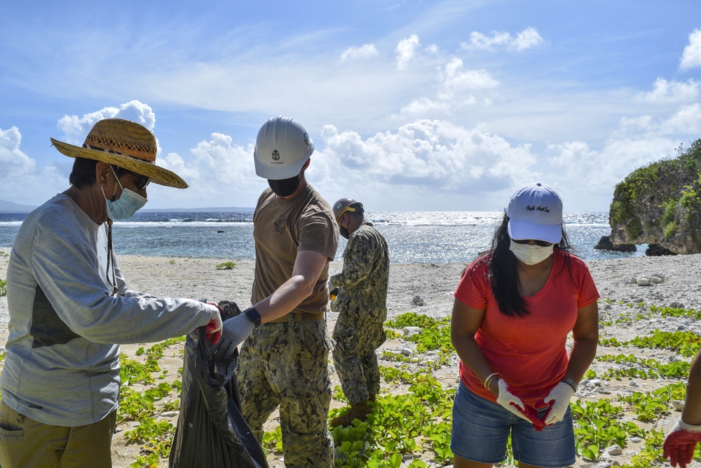 Seabees Partner with Tinian Locals to Clean Beach