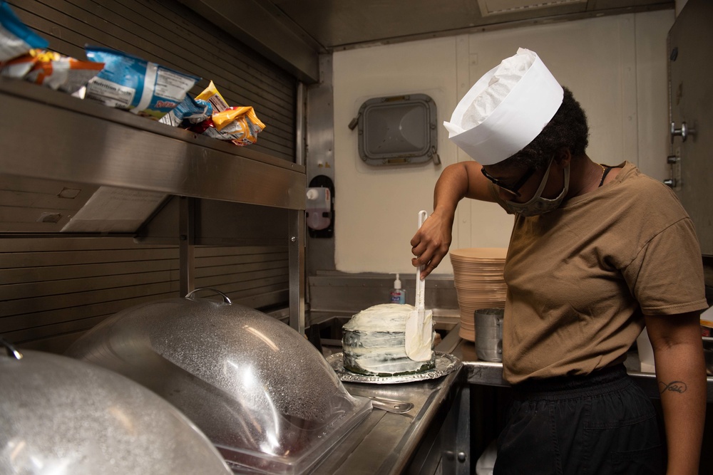 USS Princeton Sailors prepare food in the ship’s galley