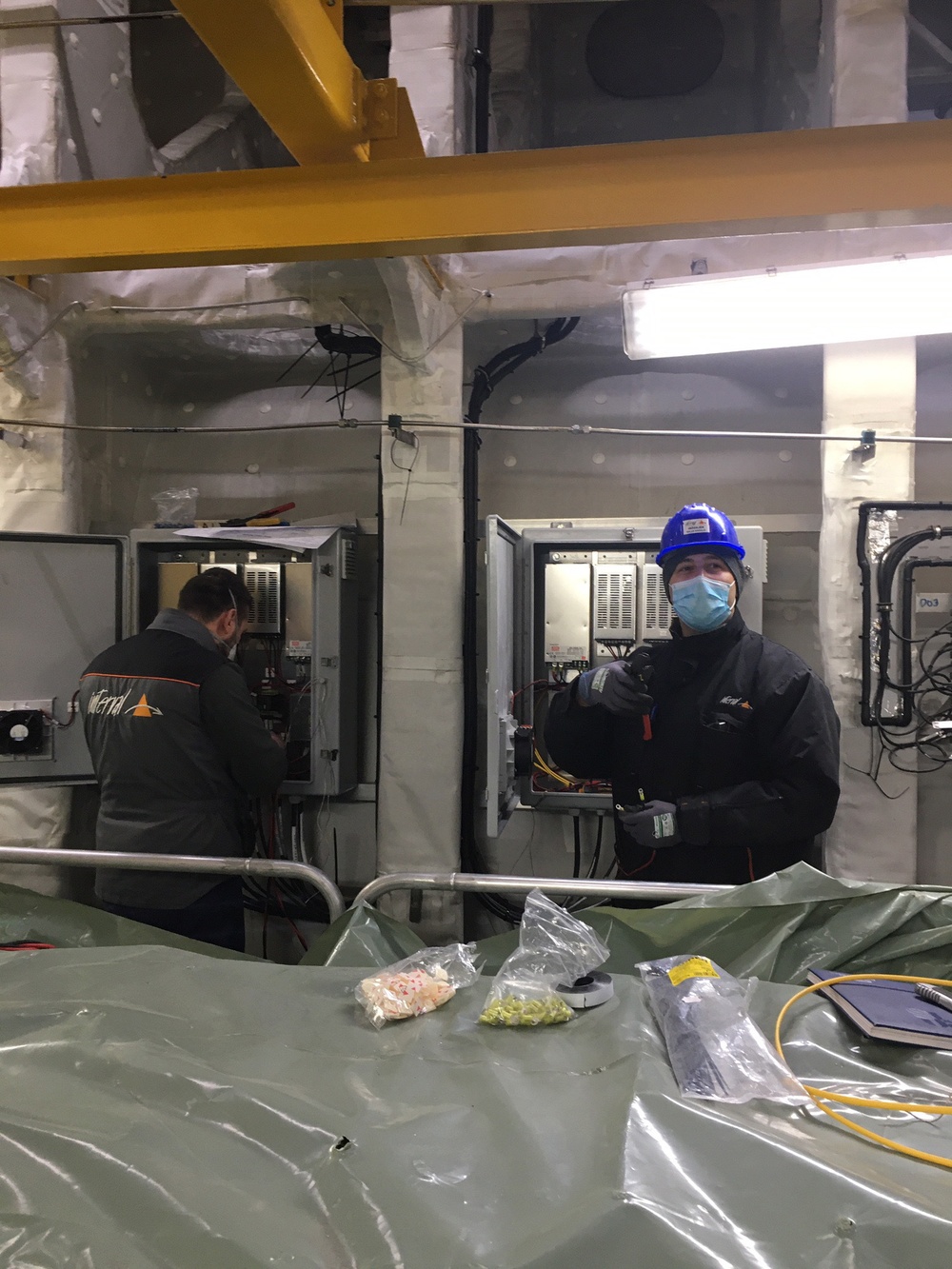 USNS Trenton crew members perform maintenance