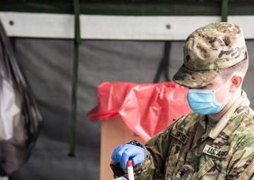 Missouri Guardsmen conduct COVID testing in Independence