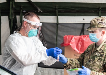 Missouri Guardsmen conduct COVID testing in Independence