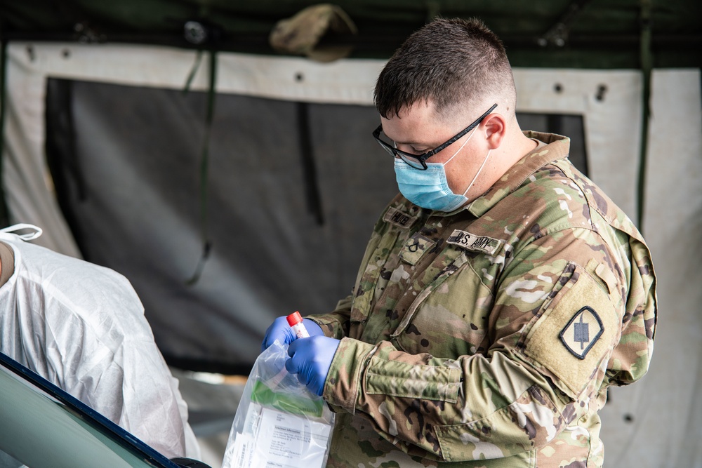 Missouri Guardsmen conduct COVID testing in Independence
