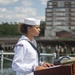 Hospital Corpsman Seaman Jaida Williams, assigned to USS Constitution, reads the names of sailors that lost their lives during the kamikaze attack aboard the USS Cassin Young (DD 793)