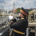 Lt. Bob Bean, retired, plays taps for the 75th anniversary of the kamikaze attacks on USS Cassin Young (DD 793)