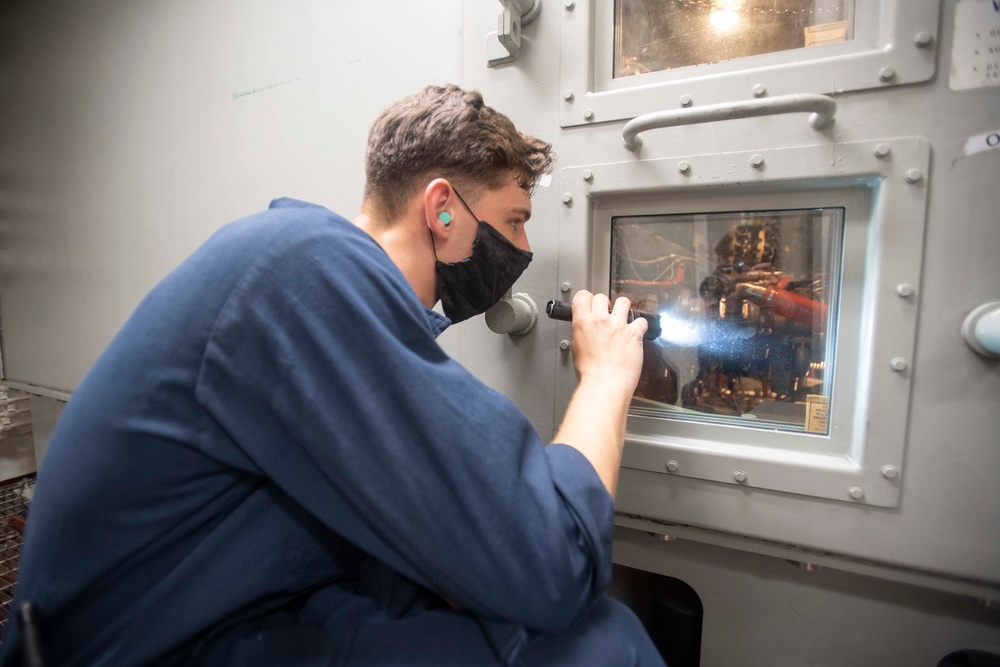 USS Ralph Johnson Sailors Maintain Engine Rooms