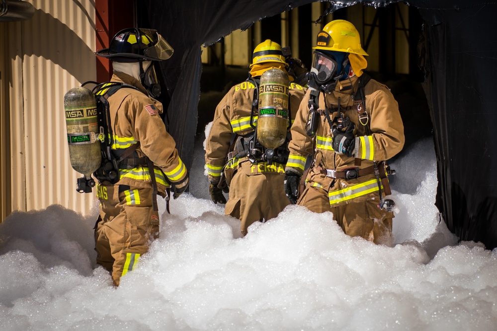 Edwards AFB firefighters conduct search and rescue training during foam test