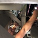 Nebraska Airmen performs routine vehicle maintenance