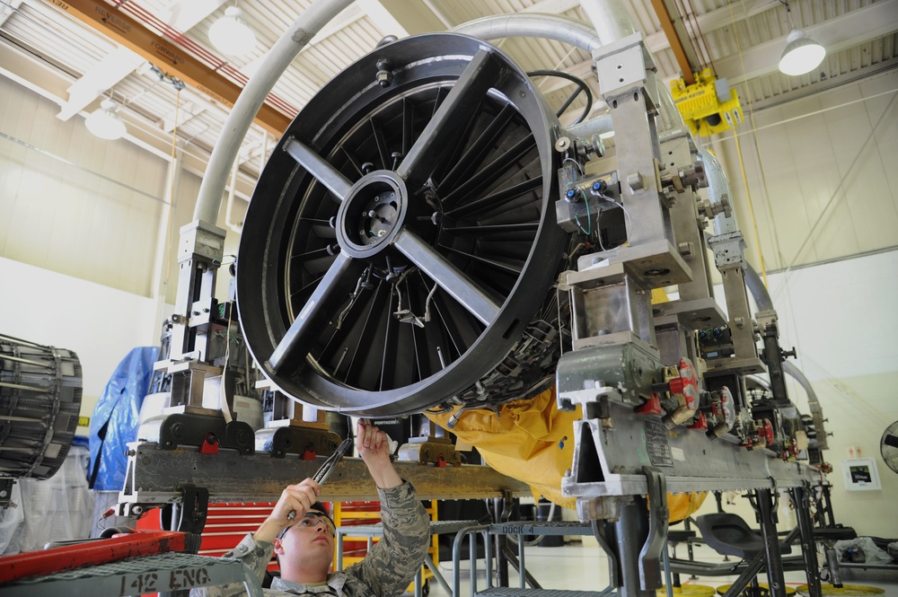 Propulsion Mechanic Performs Maintenance on F-15C Engine