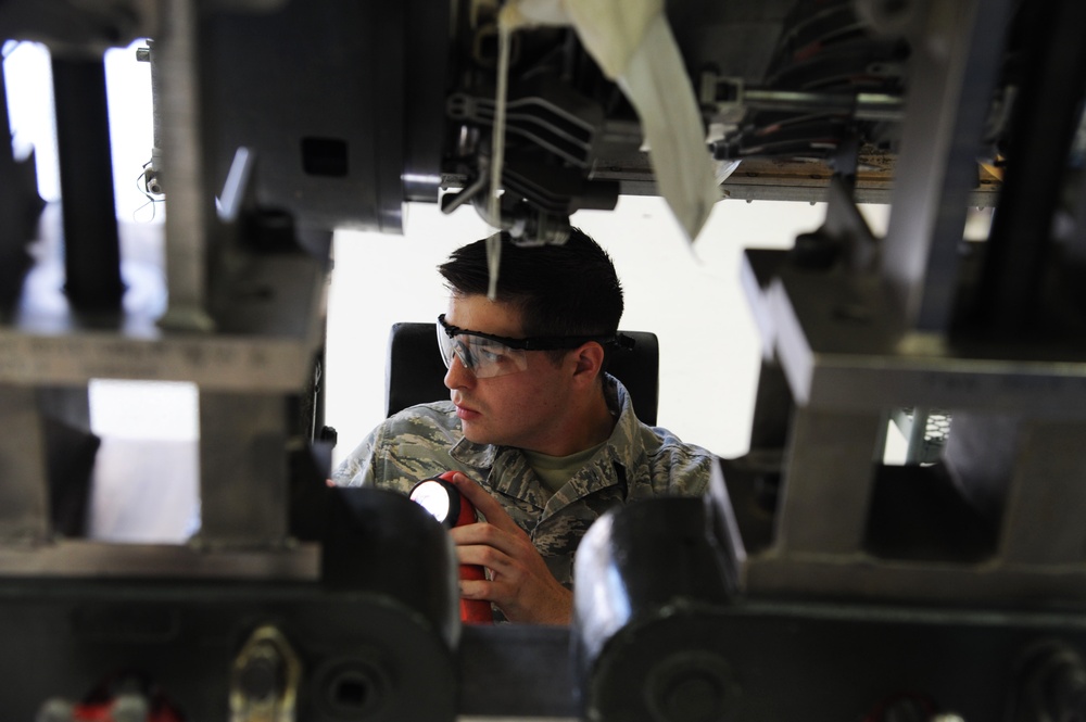 Propulsion Mechanic Performs Maintenance on F-15C Engine