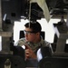 Propulsion Mechanic Performs Maintenance on F-15C Engine