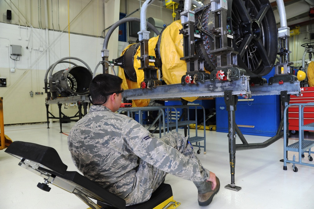 Propulsion Mechanic Performs Maintenance on F-15C Engine