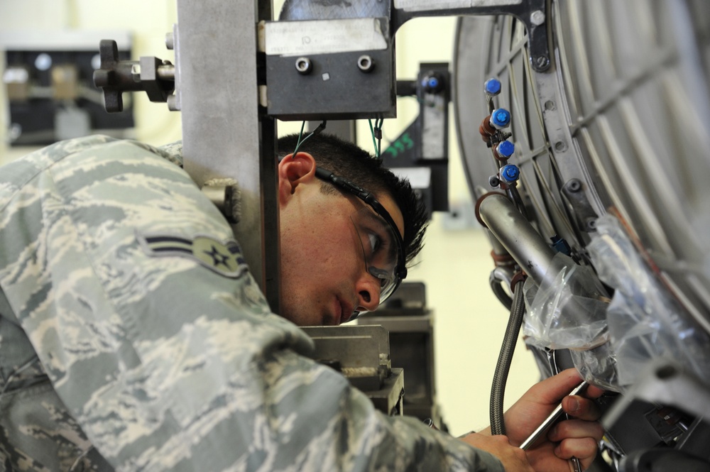 Propulsion Mechanic Performs Maintenance on F-15C Engine