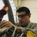 Propulsion Mechanic Performs Maintenance on F-15C Engine