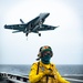 Nimitz CSG Sailor Monitors Flight Deck Landing Area