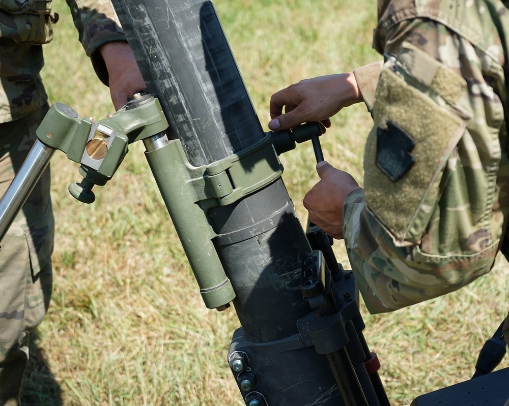 Hang it! PA Guard Soldiers deploy 120mm mortars during Annual Training