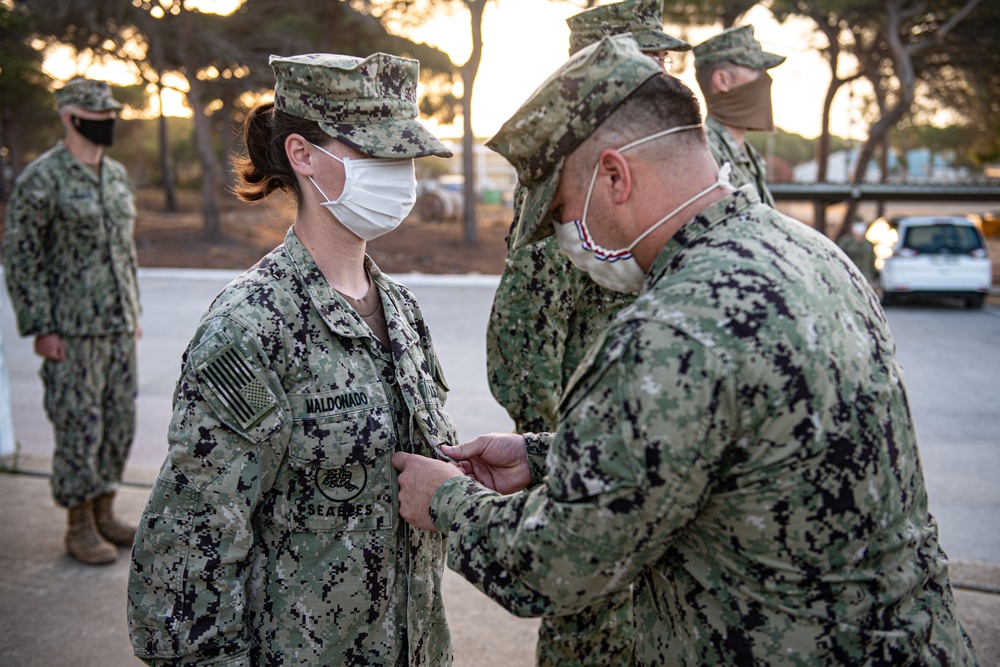 Naval Mobile Construction Battalion (NMCB) 133 holds pinning ceremony.