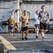 Sailors Aboard USS Germantown (LSD 42) Run on the Flight Deck During “Germantown Runs the World” Event