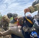 Air and Army National Guardsmen help injured hiker after rock slide