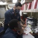 USS Ralph Johnson Sailors Conduct Audit