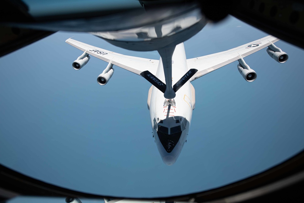 KC-135 Stratotanker refuels E-3 Sentry