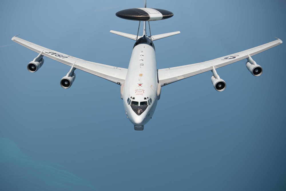 KC-135 Stratotanker refuels E-3 Sentry