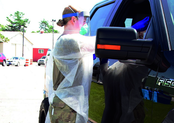Michigan National Guard giving COVID-19 tests north of the bridge