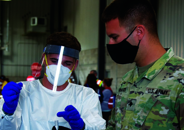 Michigan National Guard giving COVID-19 tests north of the bridge