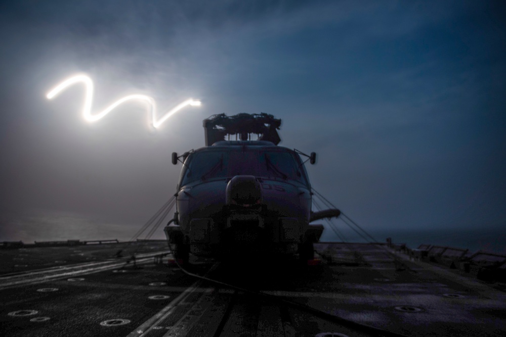 USS Princeton steams through the night