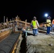Workers pour concrete at future Stockton VA clinic