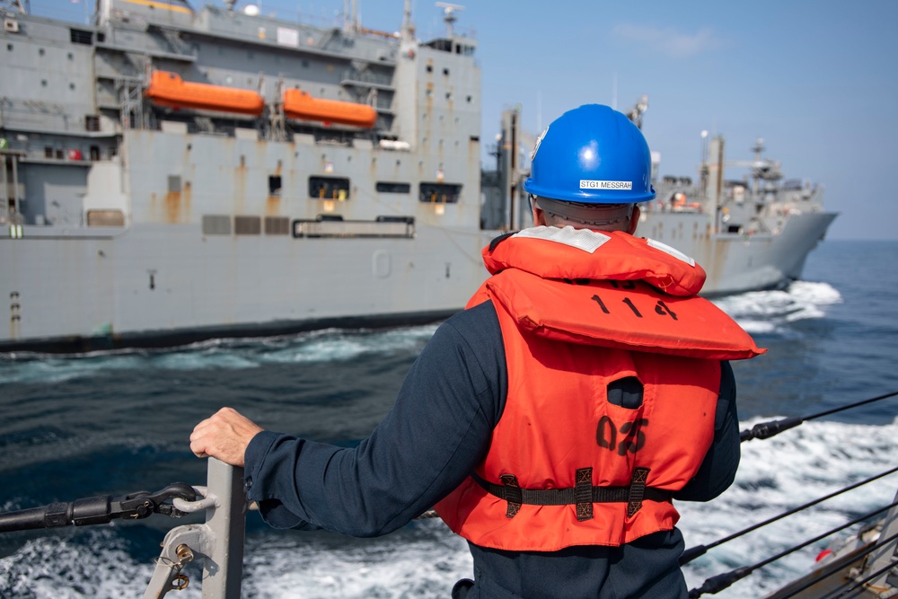 USS Ralph Johnson Conducts Replenishment-At-Sea