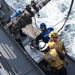USS Ralph Johnson Conducts Replenishment-At-Sea