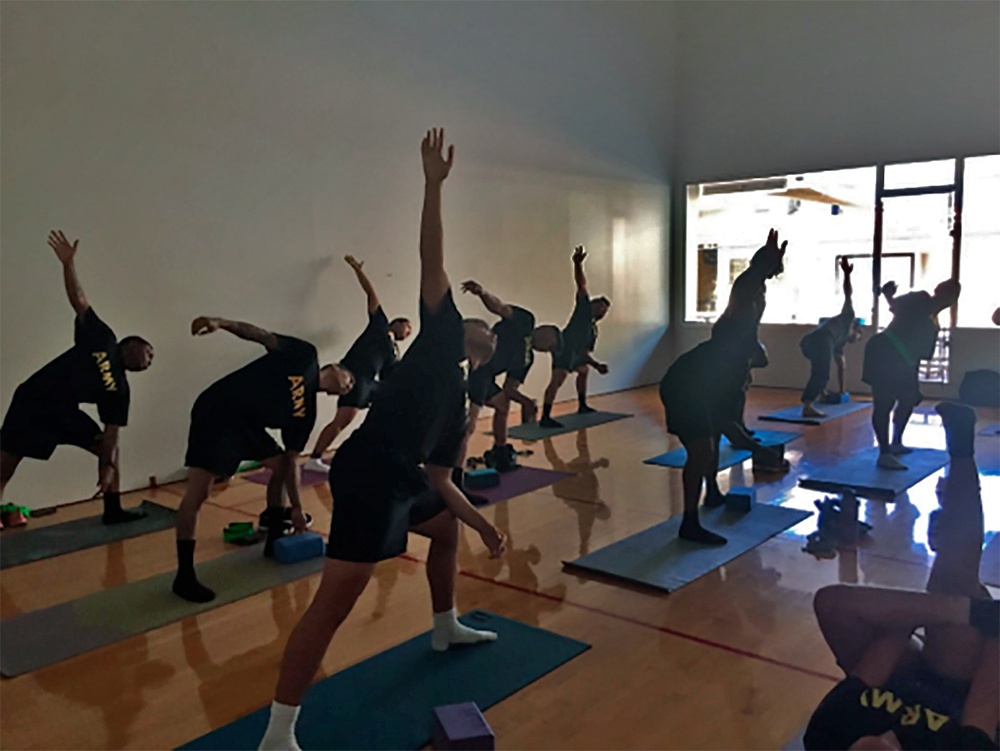 Soldiers assigned to the Soldier Recovery Unit at Schofield Barracks, HI., take a yoga class.