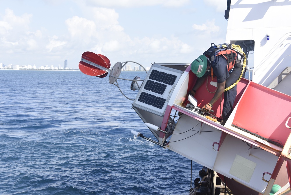 Coast Guard Cutter Joshua Appleby crew conducts maintenance on buoys near Port Everglades