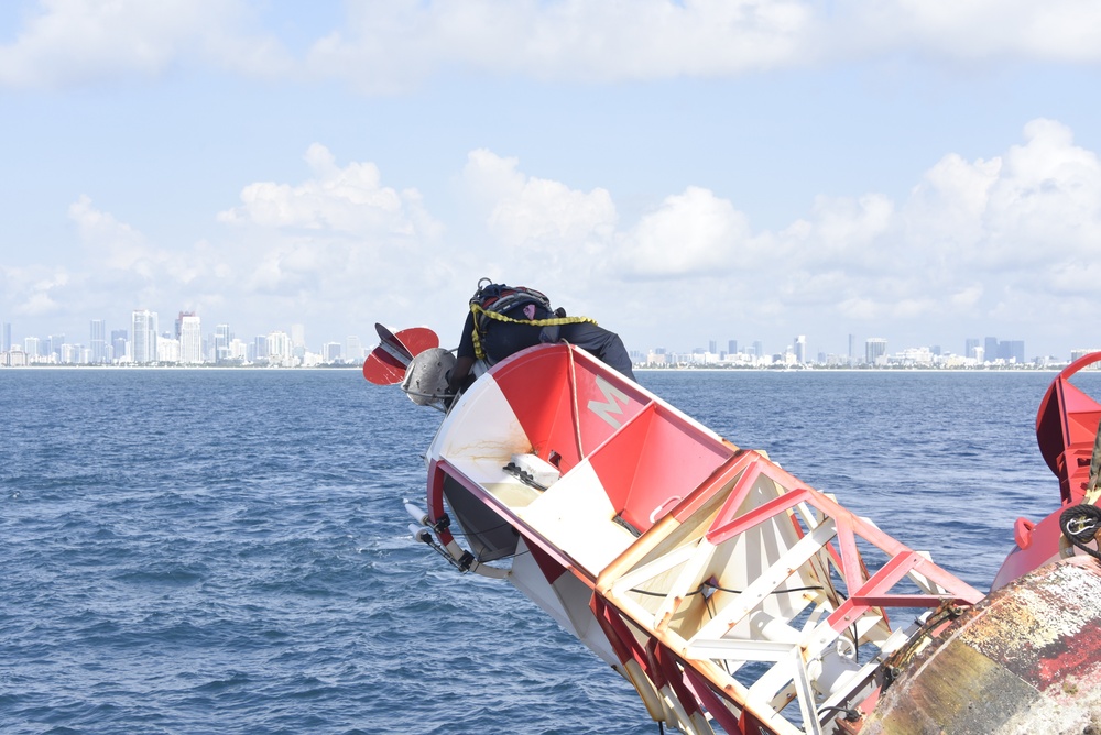 Coast Guard Cutter Joshua Appleby crew conducts maintenance on buoys near Port Everglades