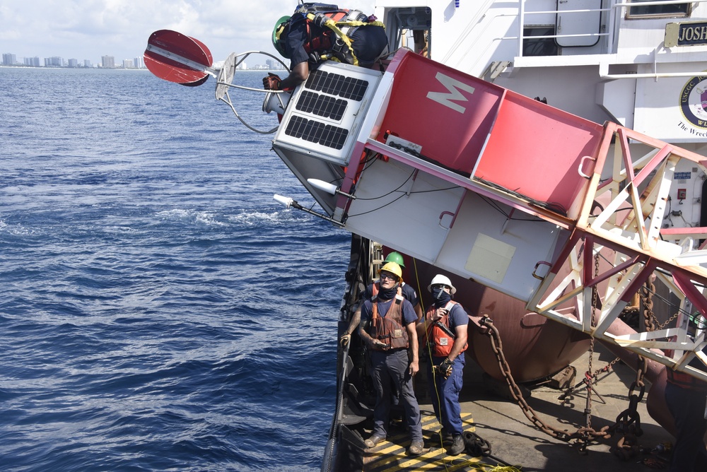 Coast Guard Cutter Joshua Appleby crew conducts maintenance on buoys near Port Everglades