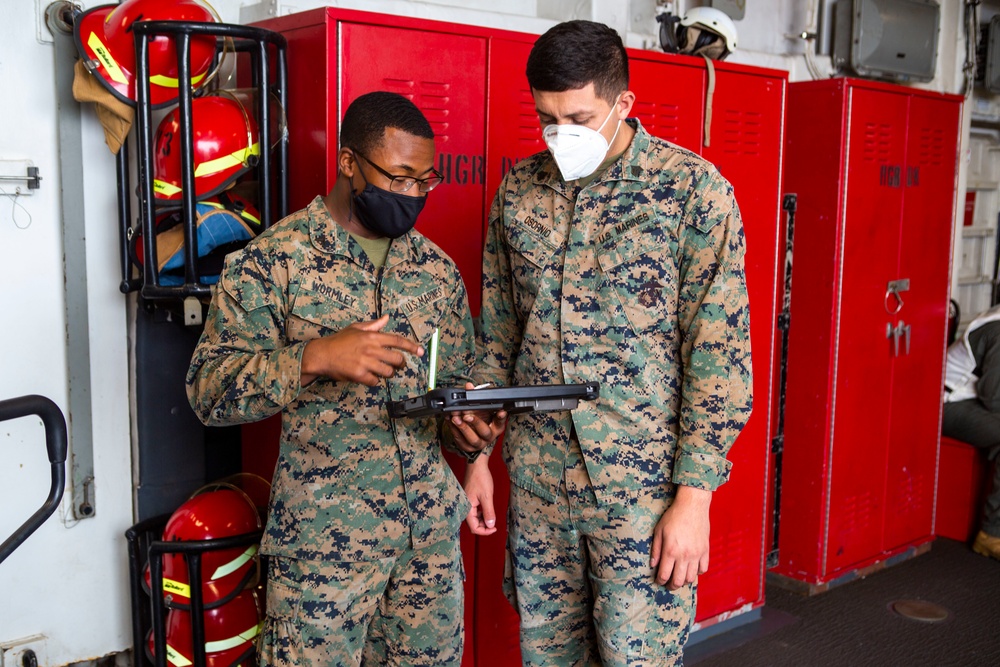 When in doubt, ship it out: 15th MEU Marines receive gear aboard USS Makin Island