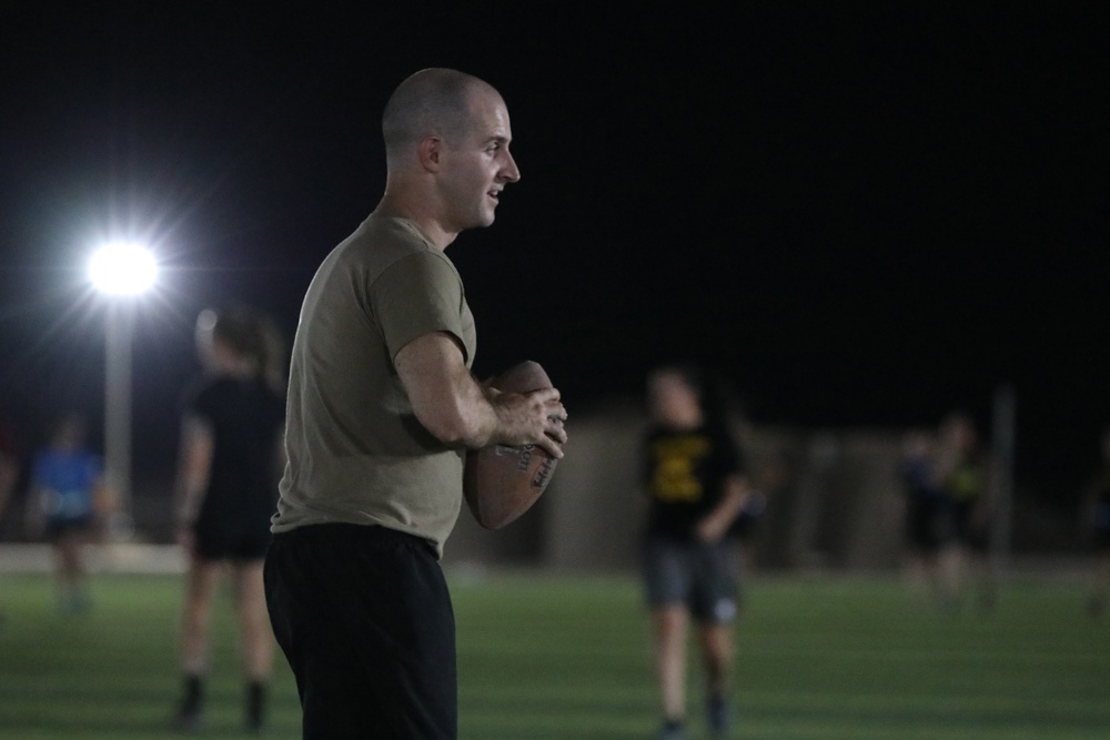 New Jersey National Guard Soldiers enjoy some night football tossing