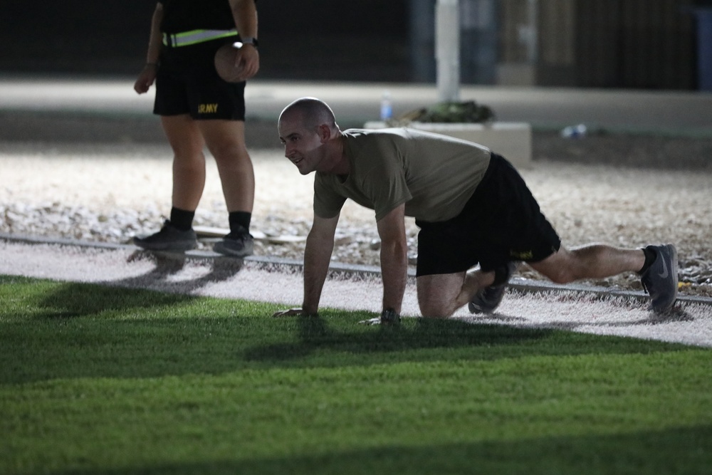 New Jersey National Guard Soldiers enjoy some night football tossing