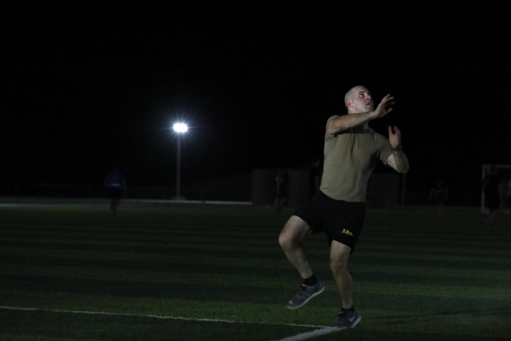New Jersey National Guard Soldiers enjoy some night football tossing