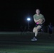 New Jersey National Guard Soldiers enjoy some night football tossing