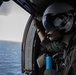USS Makin Island and HSC 23 work together in a straits transit drill.