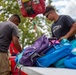 Camp Lejeune School Liaison staff and volunteers welcome students back to school