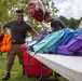 Camp Lejeune School Liaison staff and volunteers welcome students back to school