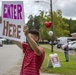 Camp Lejeune School Liaison staff and volunteers welcome students back to school