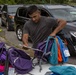 Camp Lejeune School Liaison staff and volunteers welcome students back to school