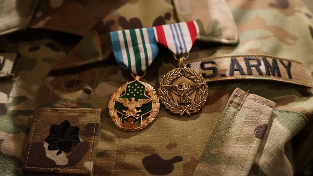 Outgoing Fort Hamilton MEPS Commander Proudly Displays New Medals