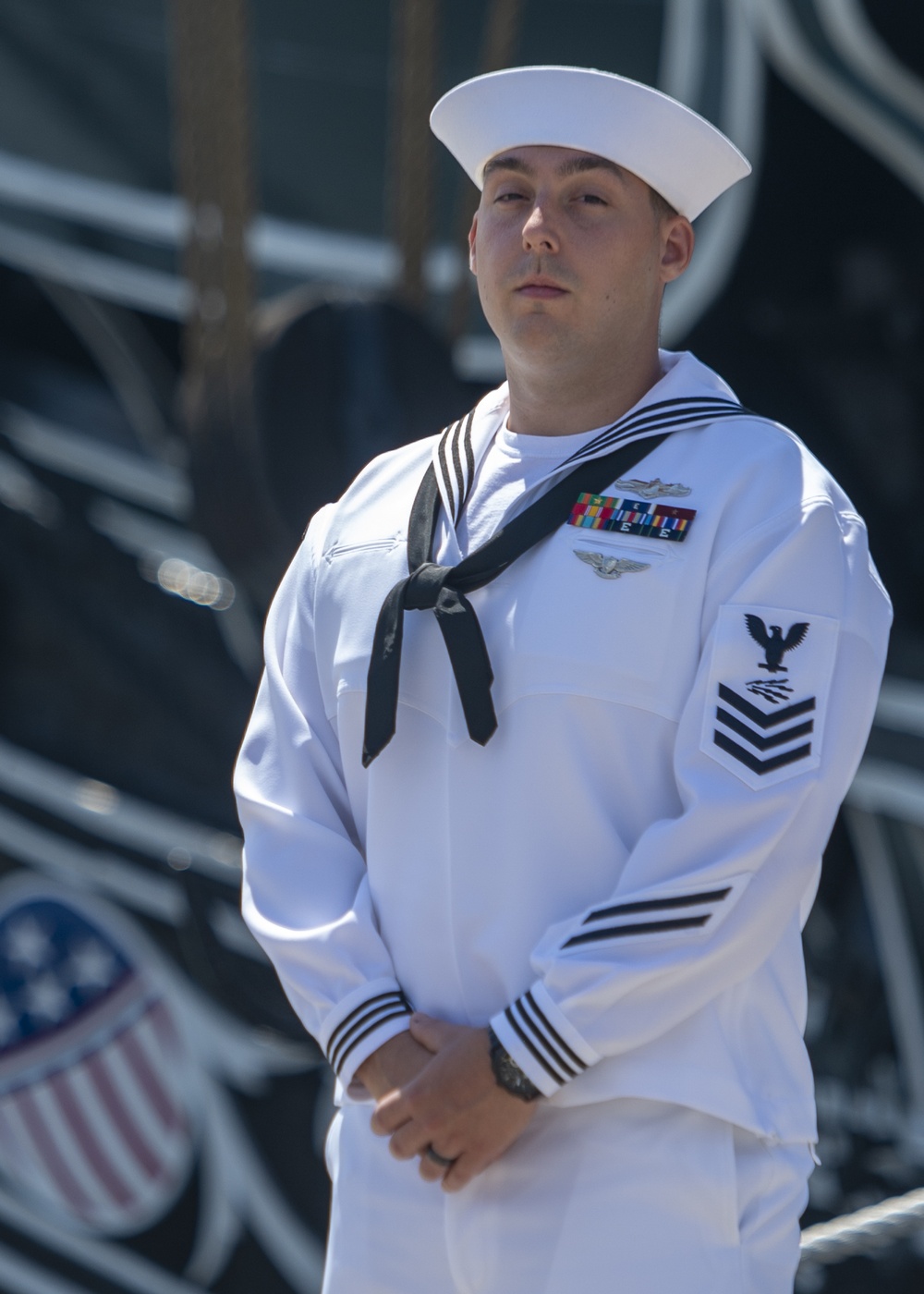 Information System Technicians 1st Class Ryan Arsenault poses for a photo