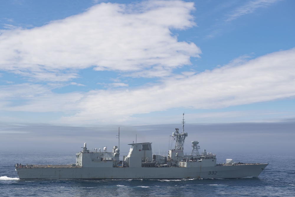 USS Thomas Hudner (DDG 116) Participates in a Replenishment-At-Sea With the Royal Canadian Ship MV Asterix.