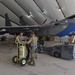 Weapons Airmen remove pylon for routine inspection