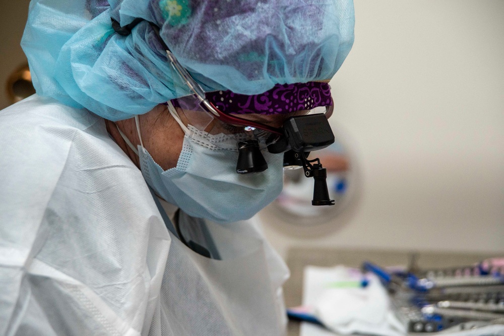 NMCSD Dentist Conducts Routine Teeth Cleaning